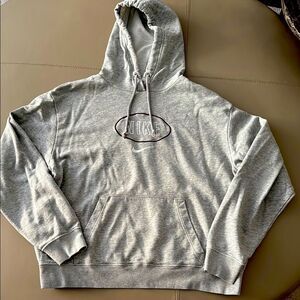 Nike Woman’s Varsity French Terry Hoodie in Heather Gray. Size S Oversized.